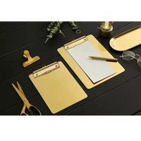 gold clipboard Reservation menu and paper
