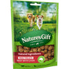 Package of Nature's Gift dog treats with two dogs in the background
