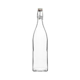 Clear glass bottle with a metal clasp on a white background