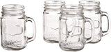 Set of four clear glass mason jars with handles on a white background