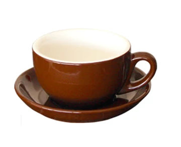 Brown ceramic cup and saucer on a white background