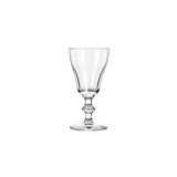 A clear glass goblet  glass with a flared rim and a short stem, Irsh coffee style glass