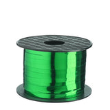 Green ribbon spool on a white background