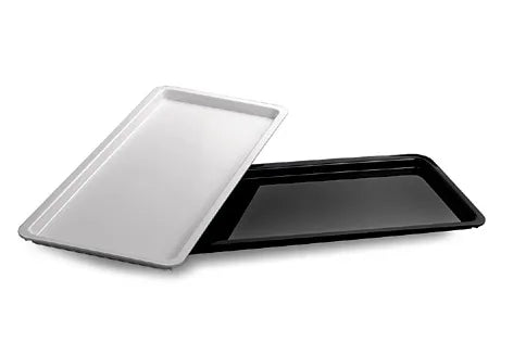 Two deli displays trays, one silver and one black, on a white background