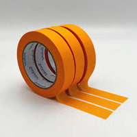 Orange tape roll on a white background