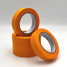 Three rolls of orange eco  tape stacked on a white background