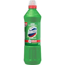 Green bottle of Domestos on a white background
