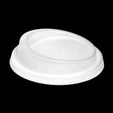 White plastic lid on a black background