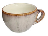Ceramic mug with a rustic finish on a white background