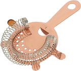 Copper cocktail strainer with metal mesh on a white background
