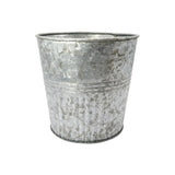 Galvanized metal bucket on a white background